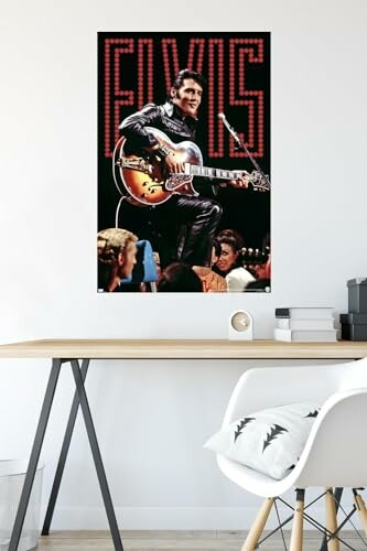 Poster of Elvis Presley on a wall above a desk