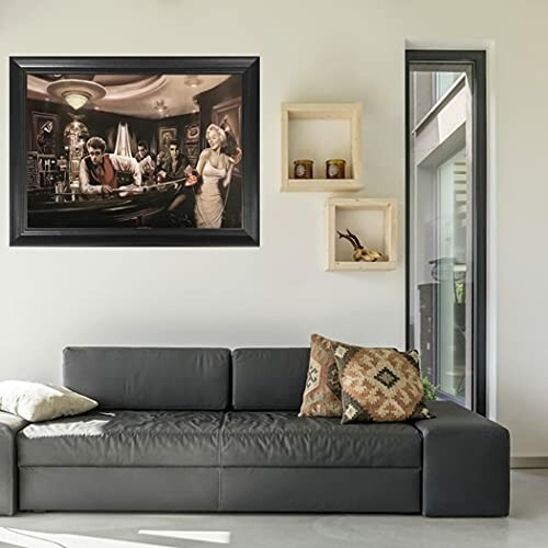 Living room with black sofa, abstract painting, and decorative shelves.